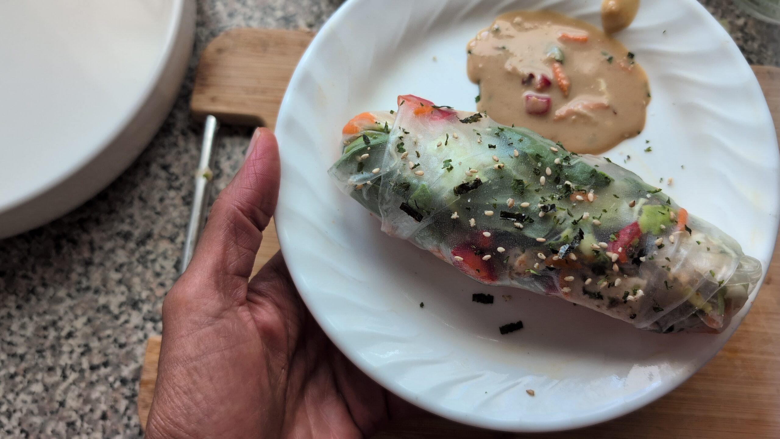 Spring Wrap Rolls on a plate with dipping sauce
